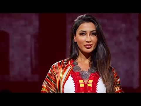 Traditional Albanian dress presented on stage in New York